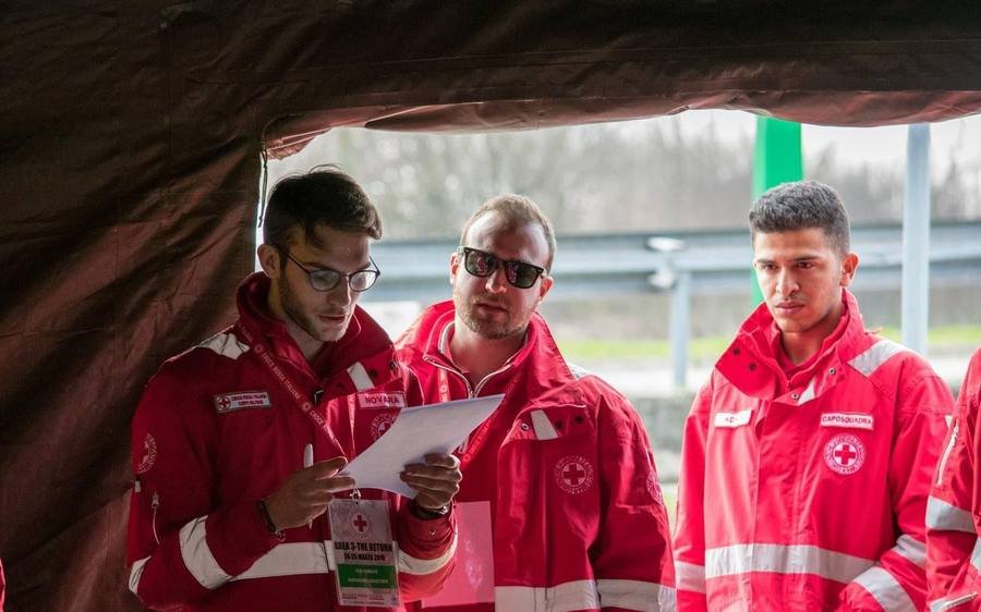 Adnan Sardi in Italian Red Cross uniform during a volunteer briefing in Novara, Italy